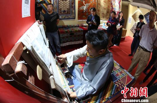 ͼΪ�ֳ���֯��̺������ ��